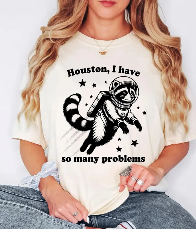 Houston I Have So Many Problems Raccoon Astronaut Unisex Graphic Tee sold by Unique Vintage