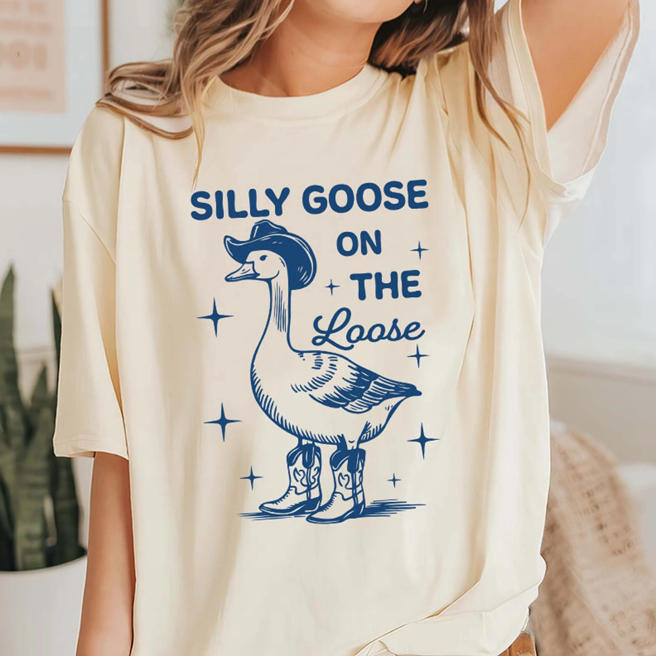 White & Blue Silly Goose On The Loose Unisex Graphic Tee sold by Unique Vintage