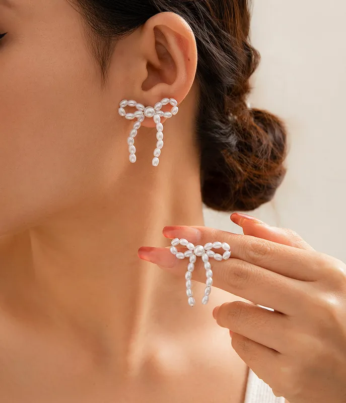 Pearl Bow French Tassel Earrings sold by Unique Vintage