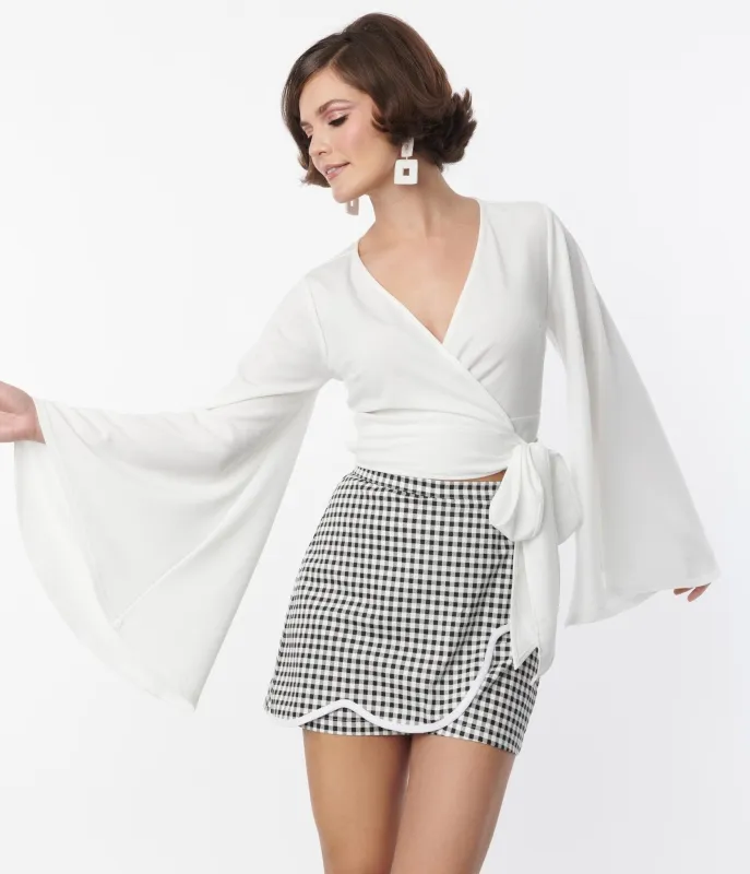 Smak Parlour 1970s White Bell Sleeve Wrap Top sold by Unique Vintage
