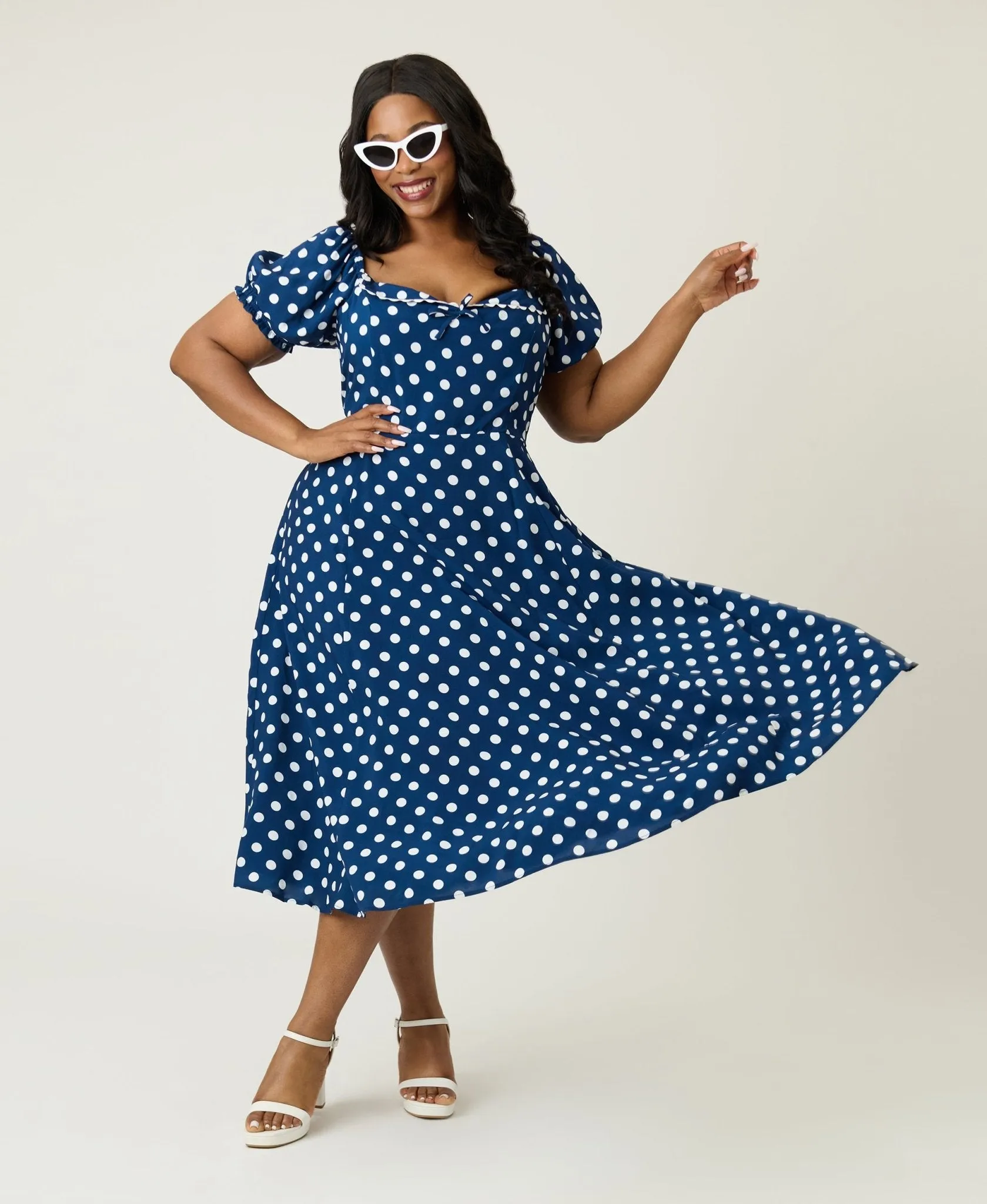Unique Vintage Plus Size Navy & White Dot Puff Sleeve Midi Dress sold by Unique Vintage