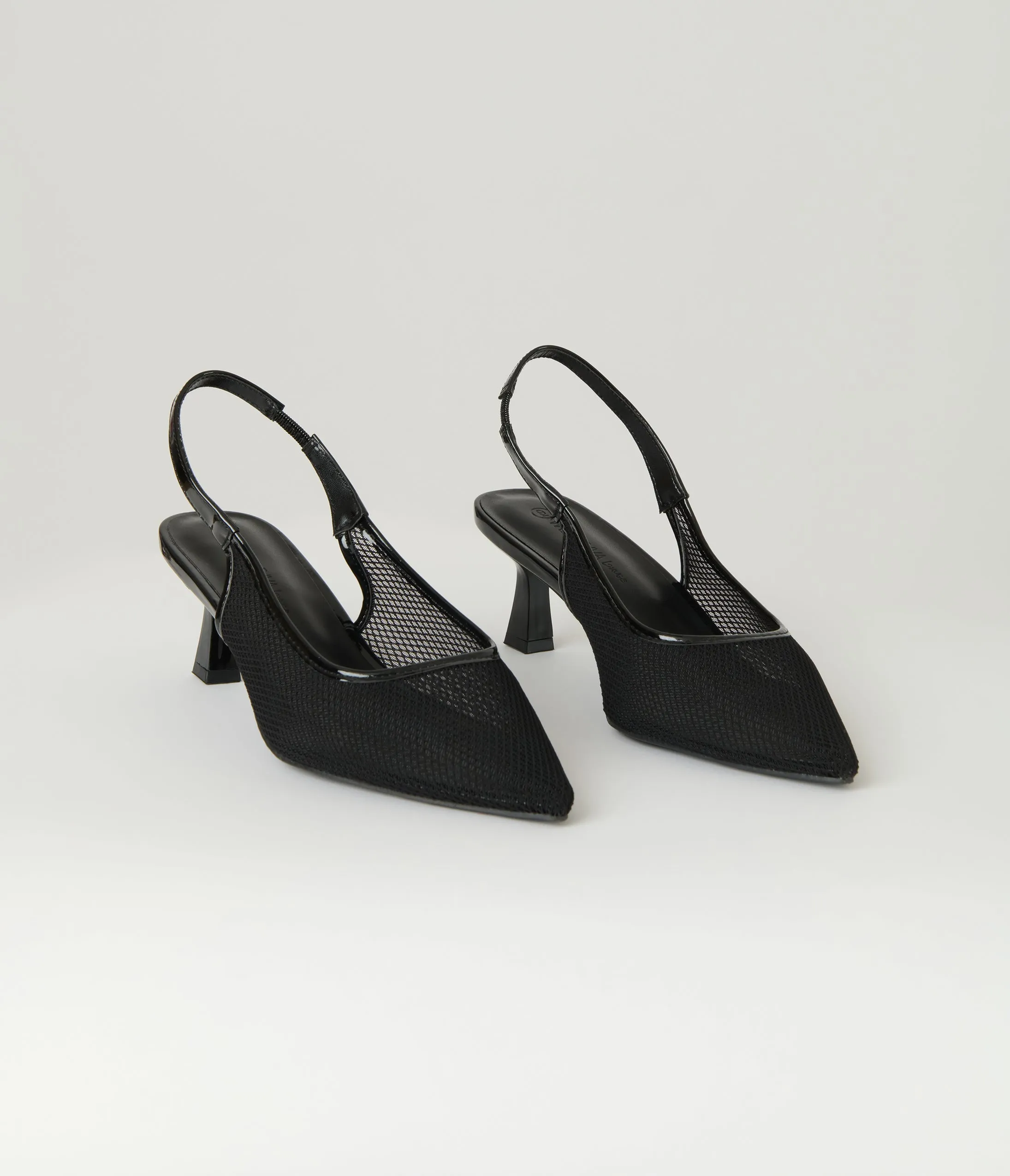 Black Mesh Pointed Toe Slingback Pumps sold by Unique Vintage