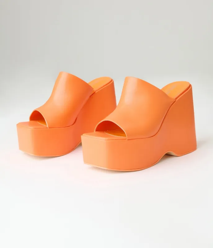 Orange Leatherette Wedge Platforms sold by Unique Vintage