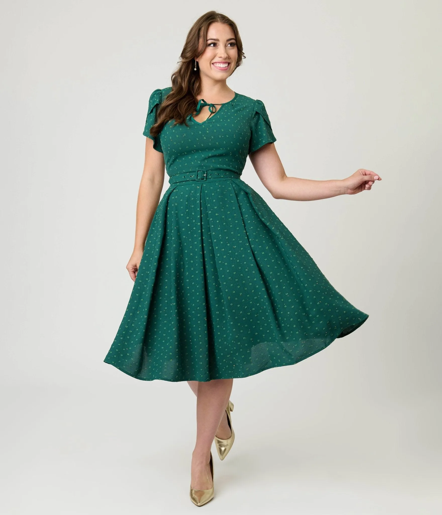 Unique Vintage Emerald & Gold Drop Dahlia Swing Dress sold by Unique Vintage