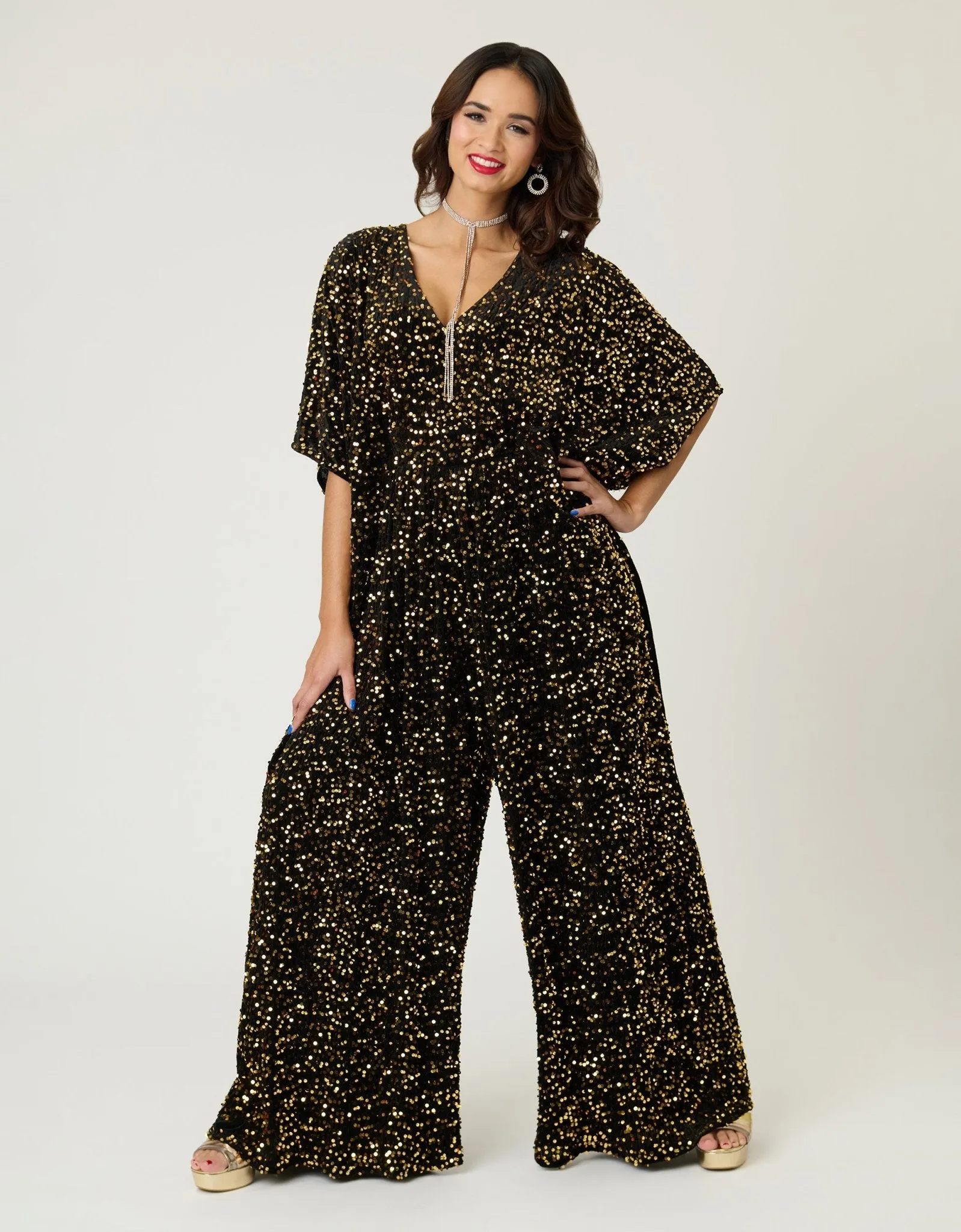 Unique Vintage Black & Gold Sequin Caftan Jumpsuit sold by Unique Vintage