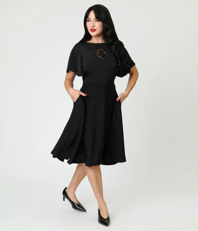 Unique Vintage Black Floral Mesh Cutout Swing Dress sold by Unique Vintage