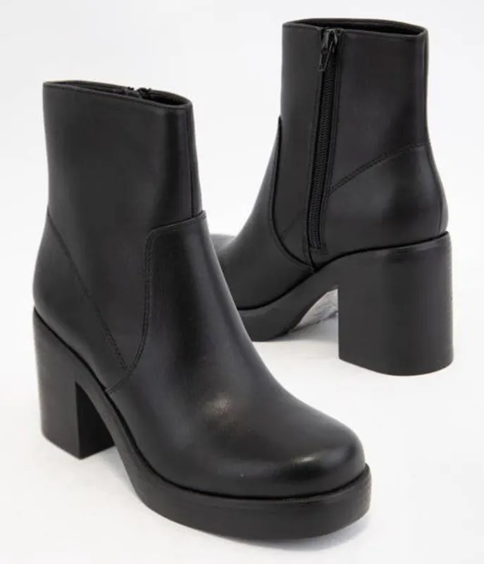 Black Leatherette Platform Booties sold by Unique Vintage