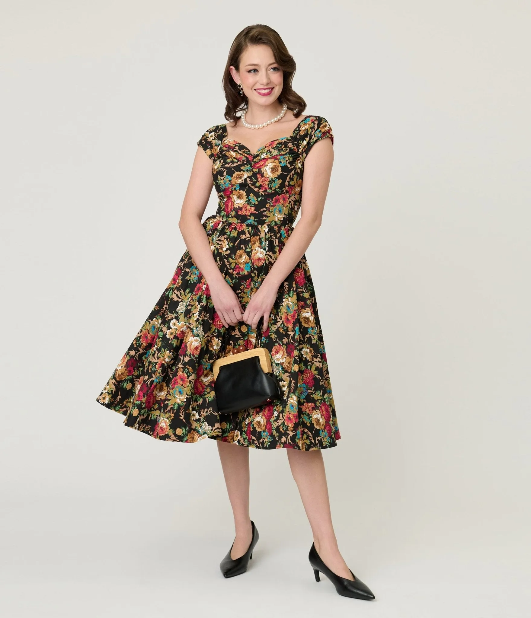 Black & Gold Floral Swing Dress sold by Unique Vintage
