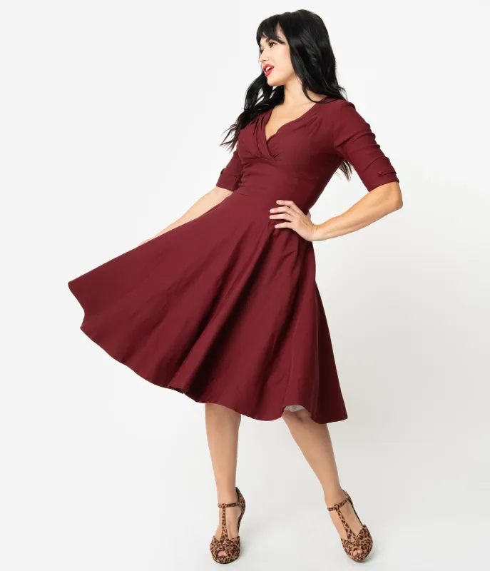 Unique Vintage 1950s Burgundy Red Delores Swing Dress with Sleeves sold by Unique Vintage