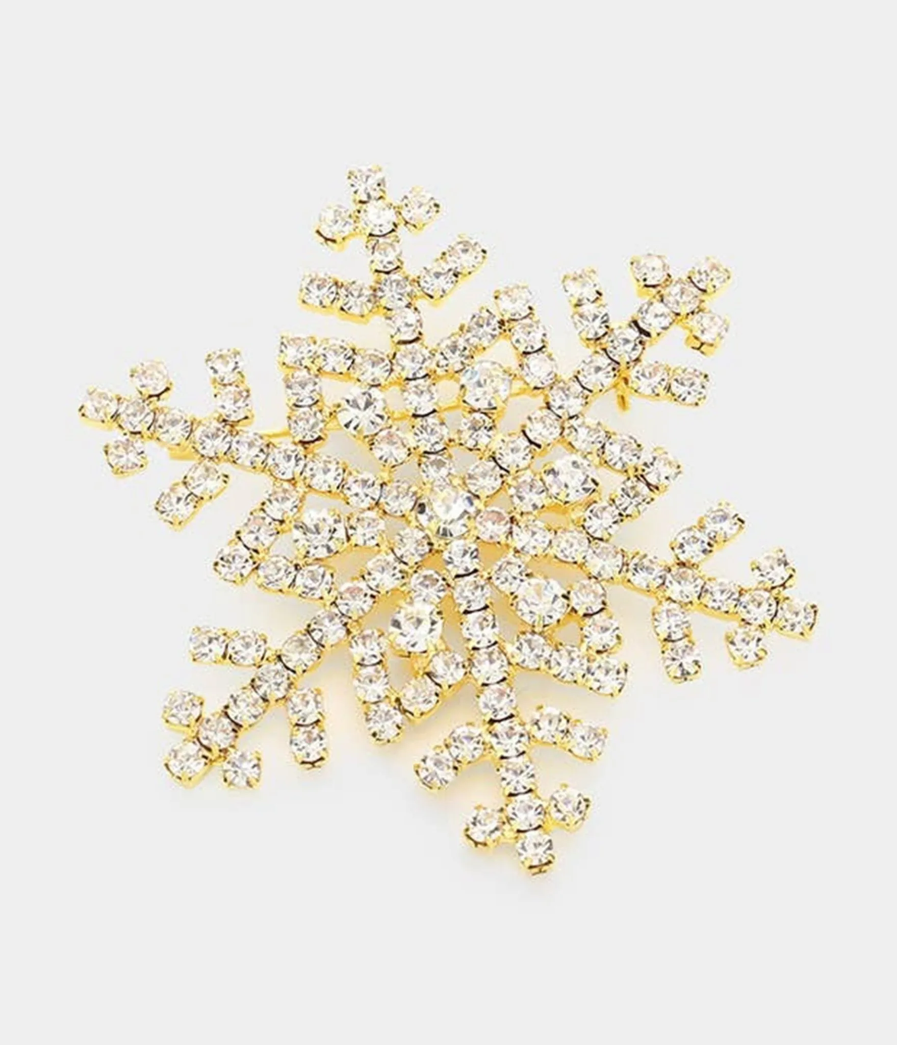 Gold Rhinestone Snowflake Brooch sold by Unique Vintage