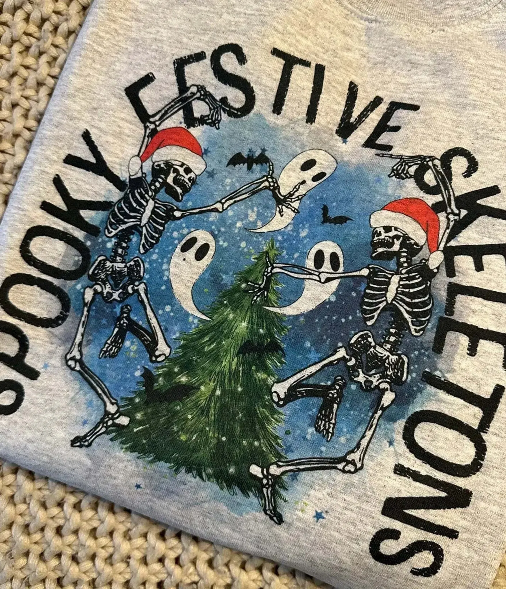 Spooky Festive Skeletons Unisex Graphic Tee sold by Unique Vintage