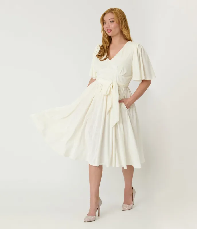 Unique Vintage Ivory Peacock Embossed Velvet Flutter Sleeve Lenora Swing Dress sold by Unique Vintage