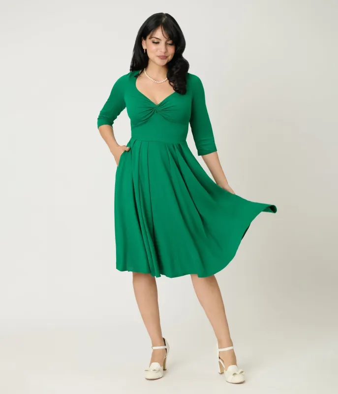 Unique Vintage Green Bengaline Front Twist Swing Dress sold by Unique Vintage