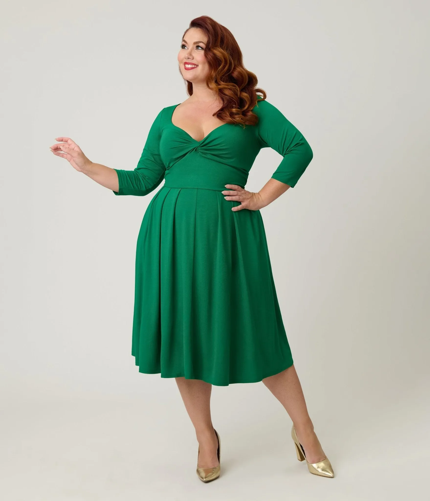 Unique Vintage Plus Size Green Bengaline Front Twist Swing Dress sold by Unique Vintage