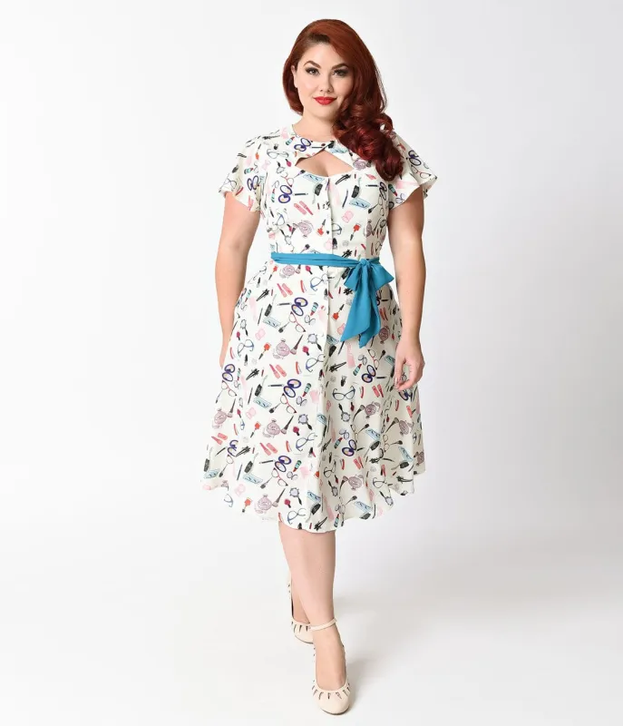 Unique Vintage Plus Size 1940s Ivory Beauty Print Ashcroft Short Sleeve Swing Dress made by Unique Vintage