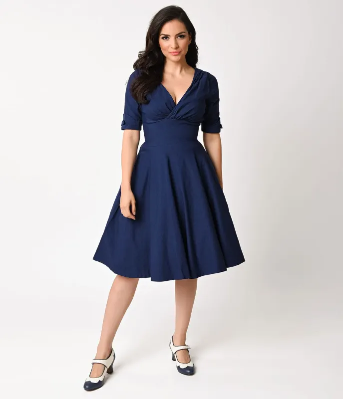 Unique Vintage 1950s Navy Blue Delores Swing Dress with Sleeves made by Unique Vintage