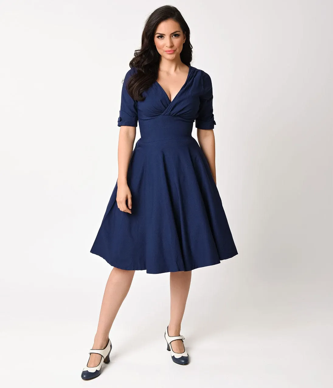 Unique Vintage 1950s Navy Blue Delores Swing Dress with Sleeves sold by Unique Vintage