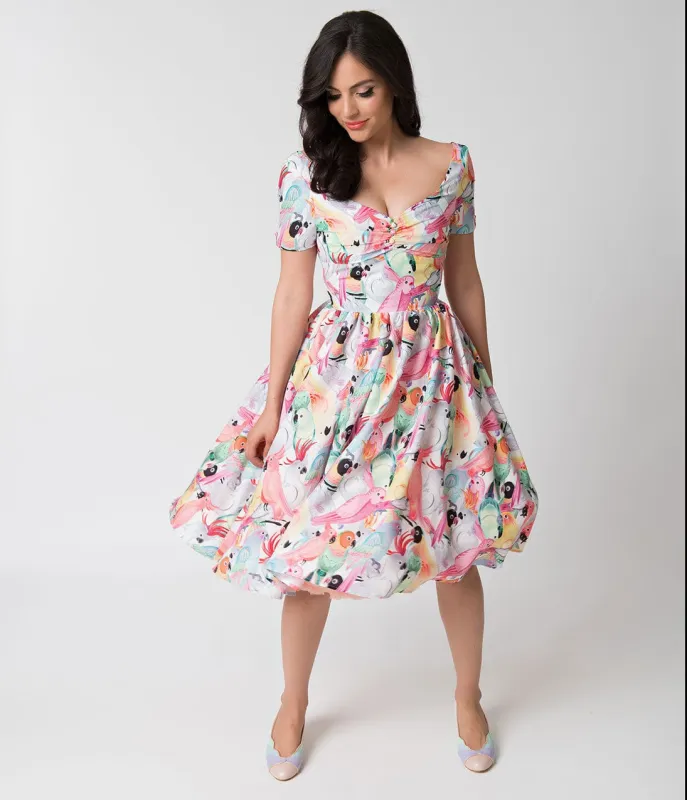 Unique Vintage 1950s Style Multicolor Parrot Print Short Sleeve Draper Swing Dress made by Unique Vintage
