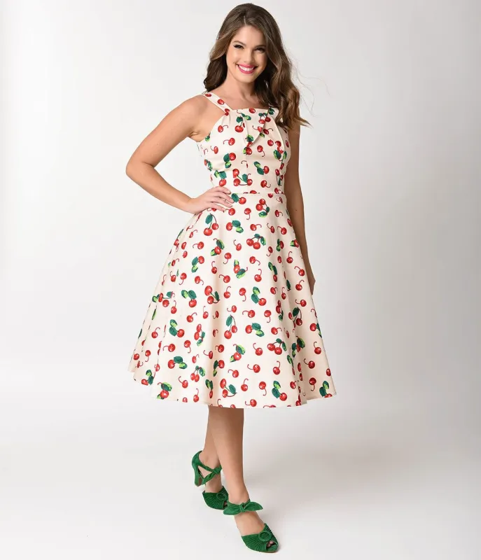 Unique Vintage 1950s Style Peach & Red Cherry Print Savannah Swing Dress made by Unique Vintage