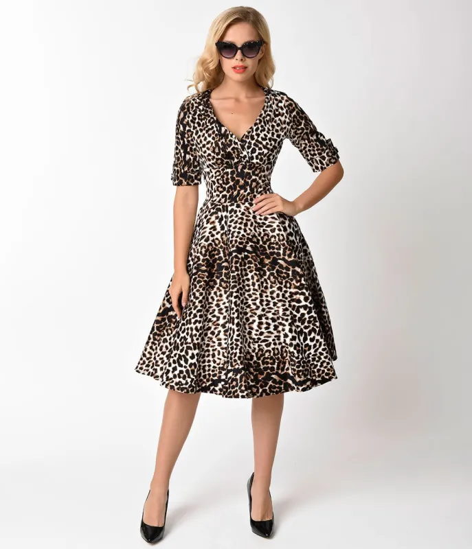 Unique Vintage 1950s Leopard Print Delores Swing Dress with Sleeves sold by Unique Vintage