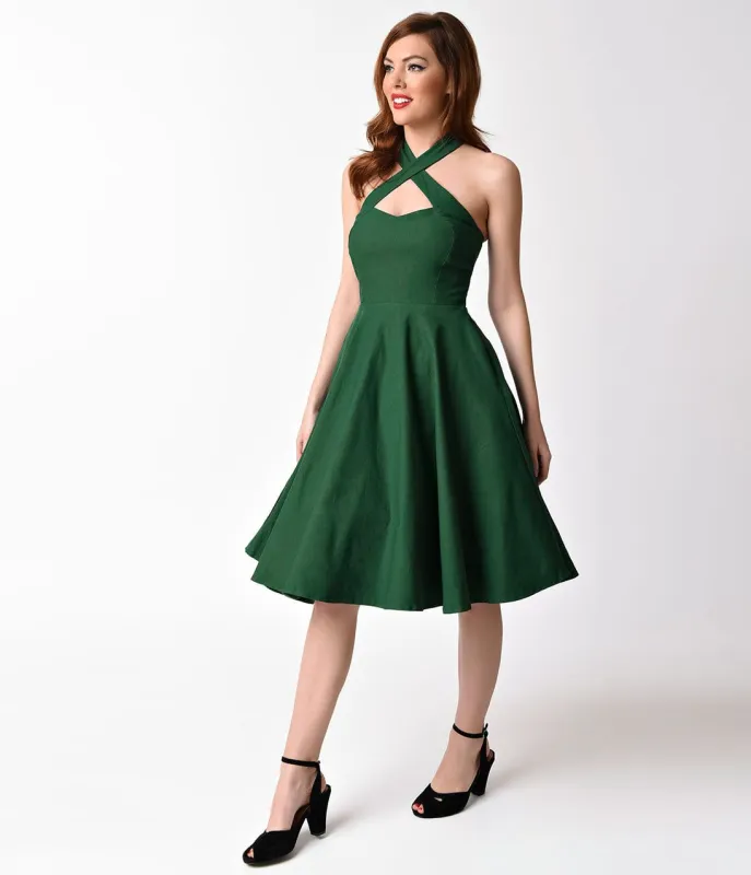 Unique Vintage 1950s Emerald Green Cross Halter Rita Flare Dress made by Unique Vintage