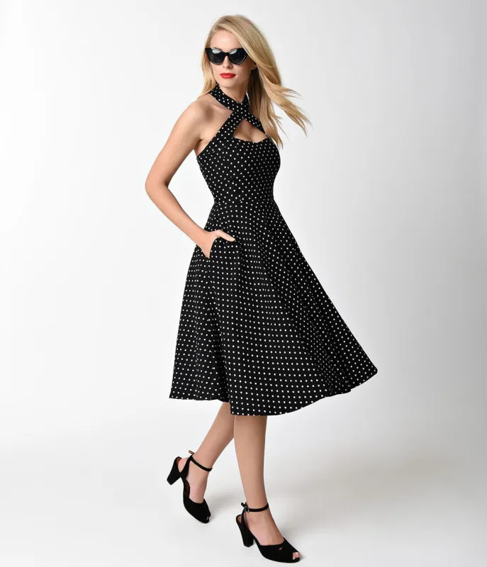 Unique Vintage 1950s Style Black & Ivory Dot Criss Cross Halter Flare Rita Dress made by Unique Vintage