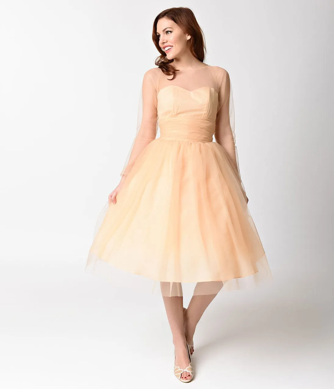 Unique Vintage Peach Mesh Long Sleeved Dita Swing Dress sold by Unique Vintage