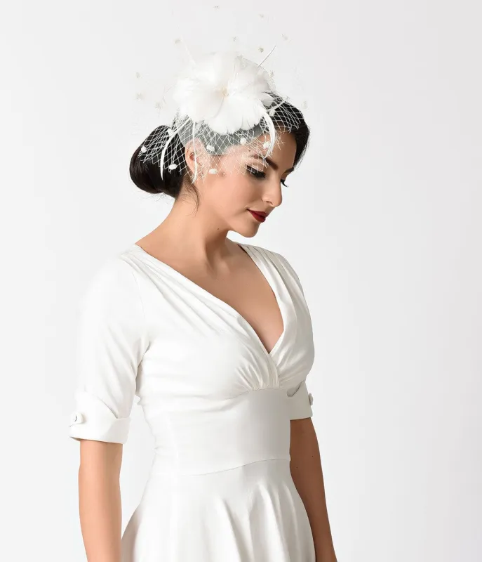 Unique Vintage White Feather & Sinamay Netted Fascinator sold by Unique Vintage