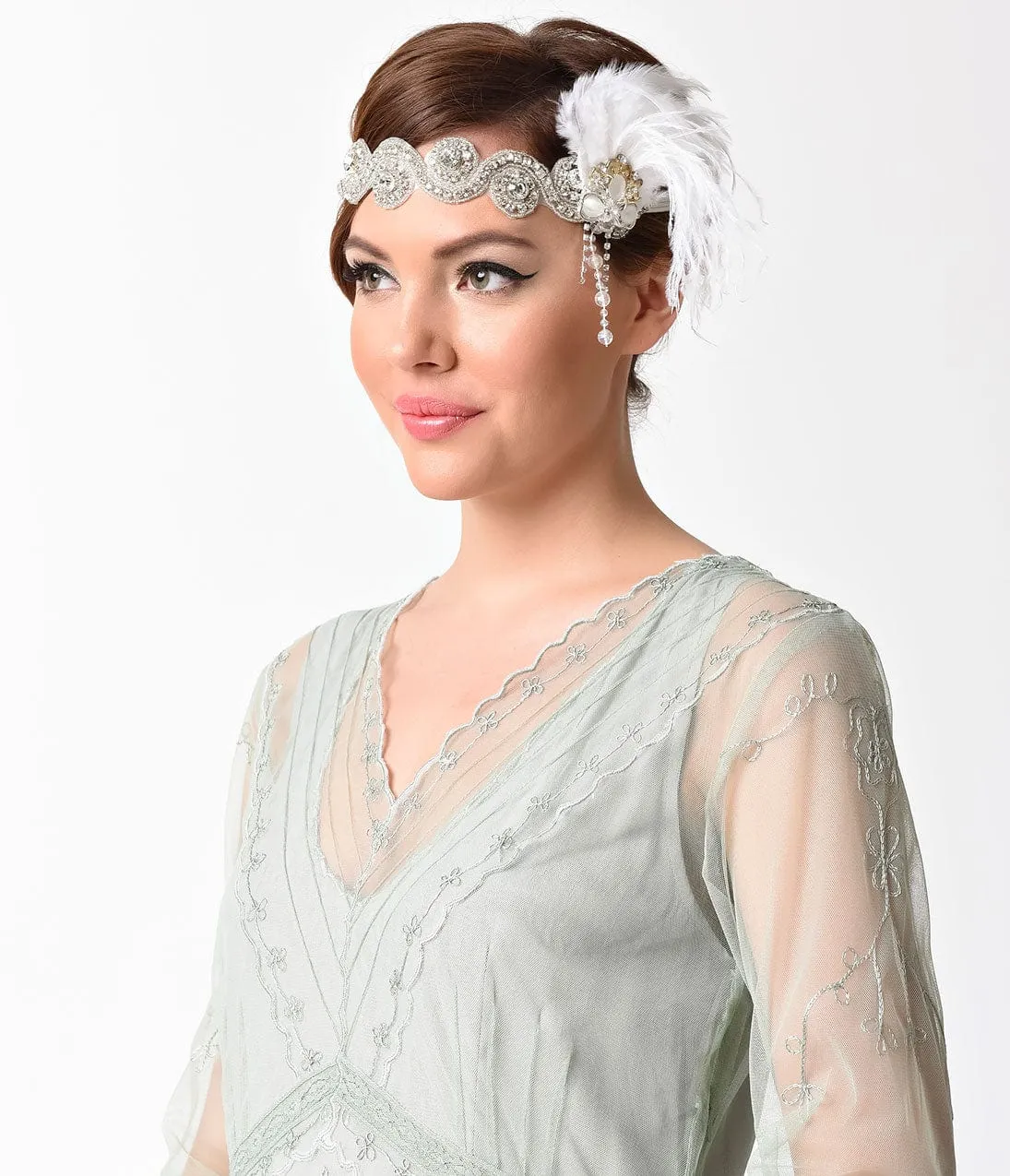 1920s Style Silver Rhinestone Swirl & White Feather Headband sold by Unique Vintage