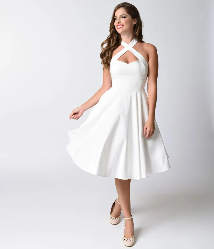 Unique Vintage 1950s Style Ivory Criss Cross Halter Flare Rita Dress made by Unique Vintage