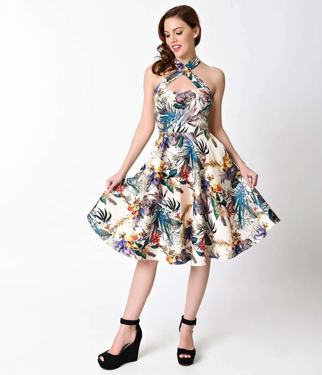 Unique Vintage 1950s Style Tropical Flourish Criss Cross Halter Flare Rita Dress sold by Unique Vintage