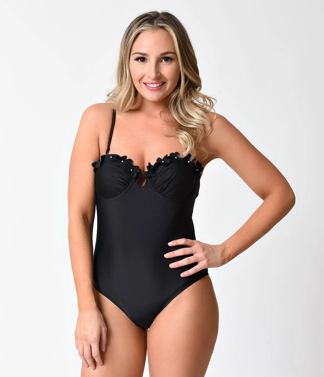 1960s Mod Style Black Floral Embellished Cutout One Piece Swimsuit sold by Unique Vintage