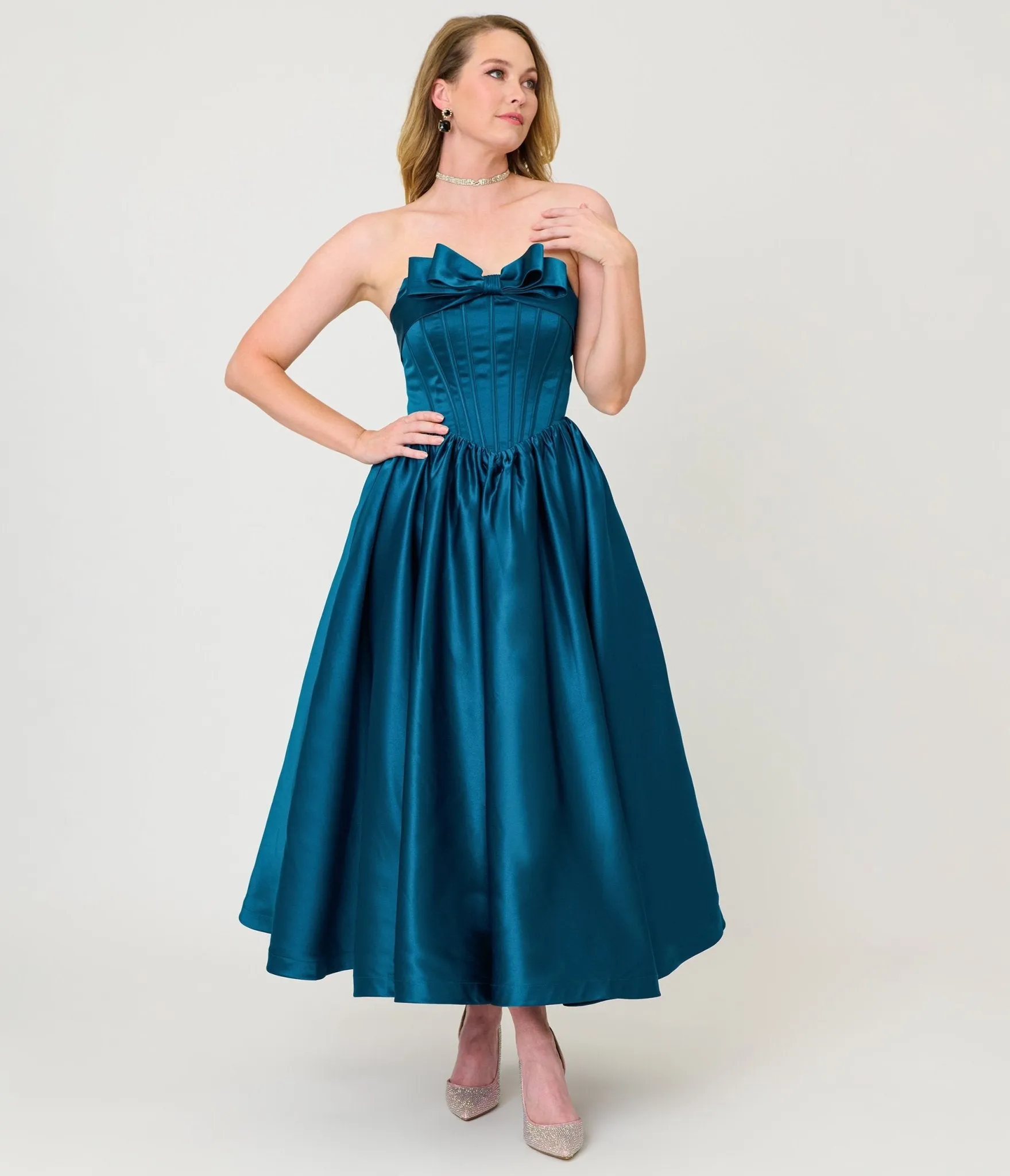 Unique Vintage Teal Bow Strapless Tea Length Gown sold by Unique Vintage