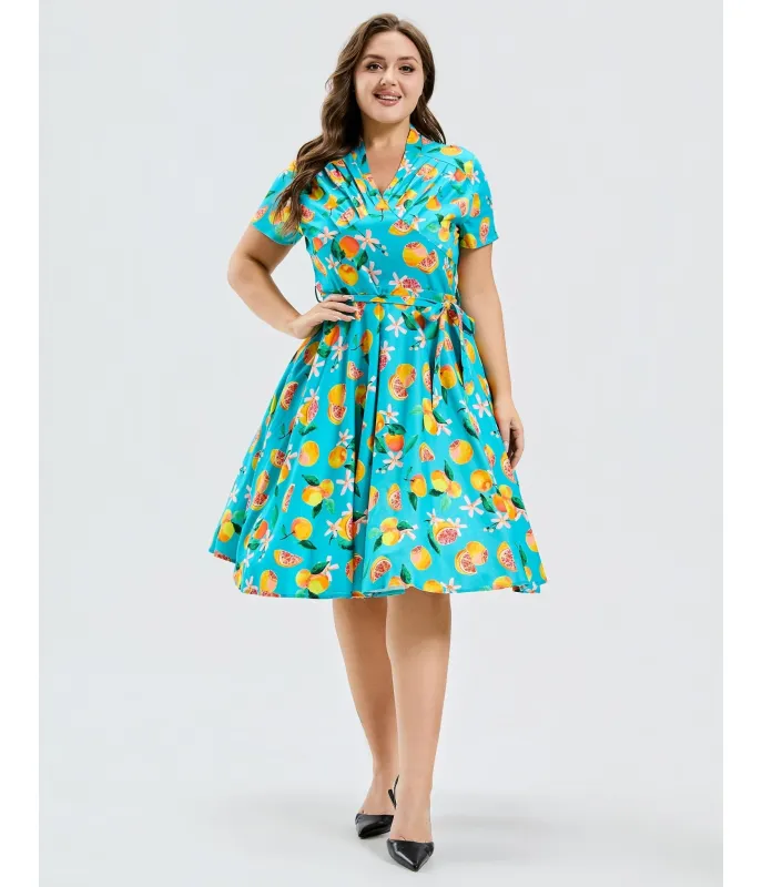 Plus Size Turquoise Grapefruit Groove Rose Swing Dress made by Unique Vintage