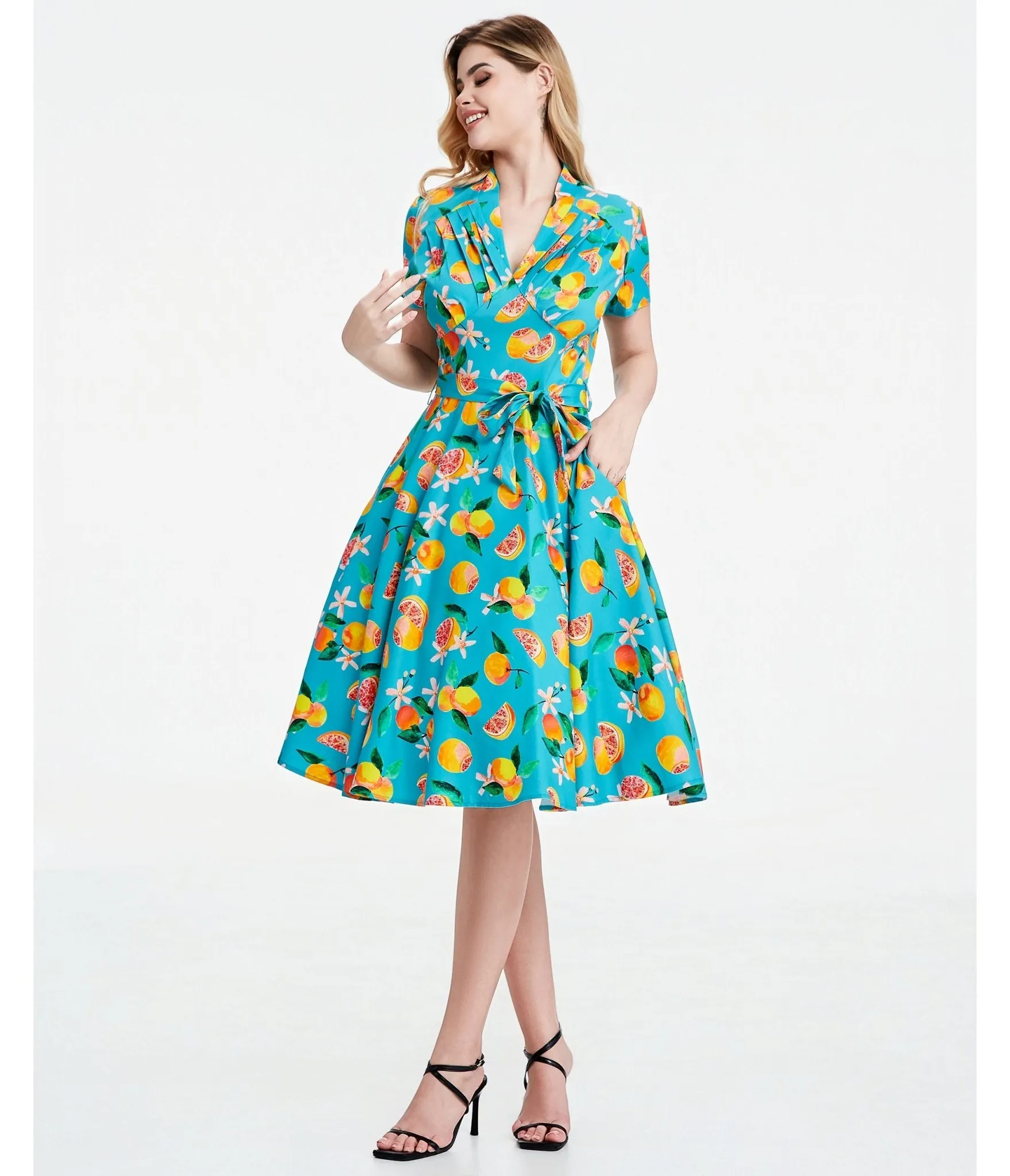 Turquoise Grapefruit Groove Rose Swing Dress sold by Unique Vintage