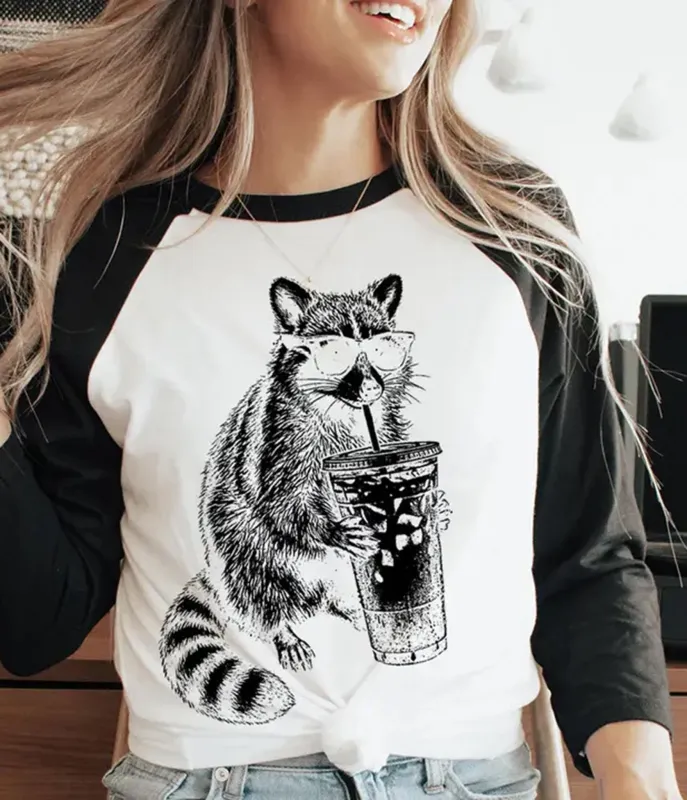 Raccoon Drinking Iced Coffee Raglan Graphic Tee made by Unique Vintage