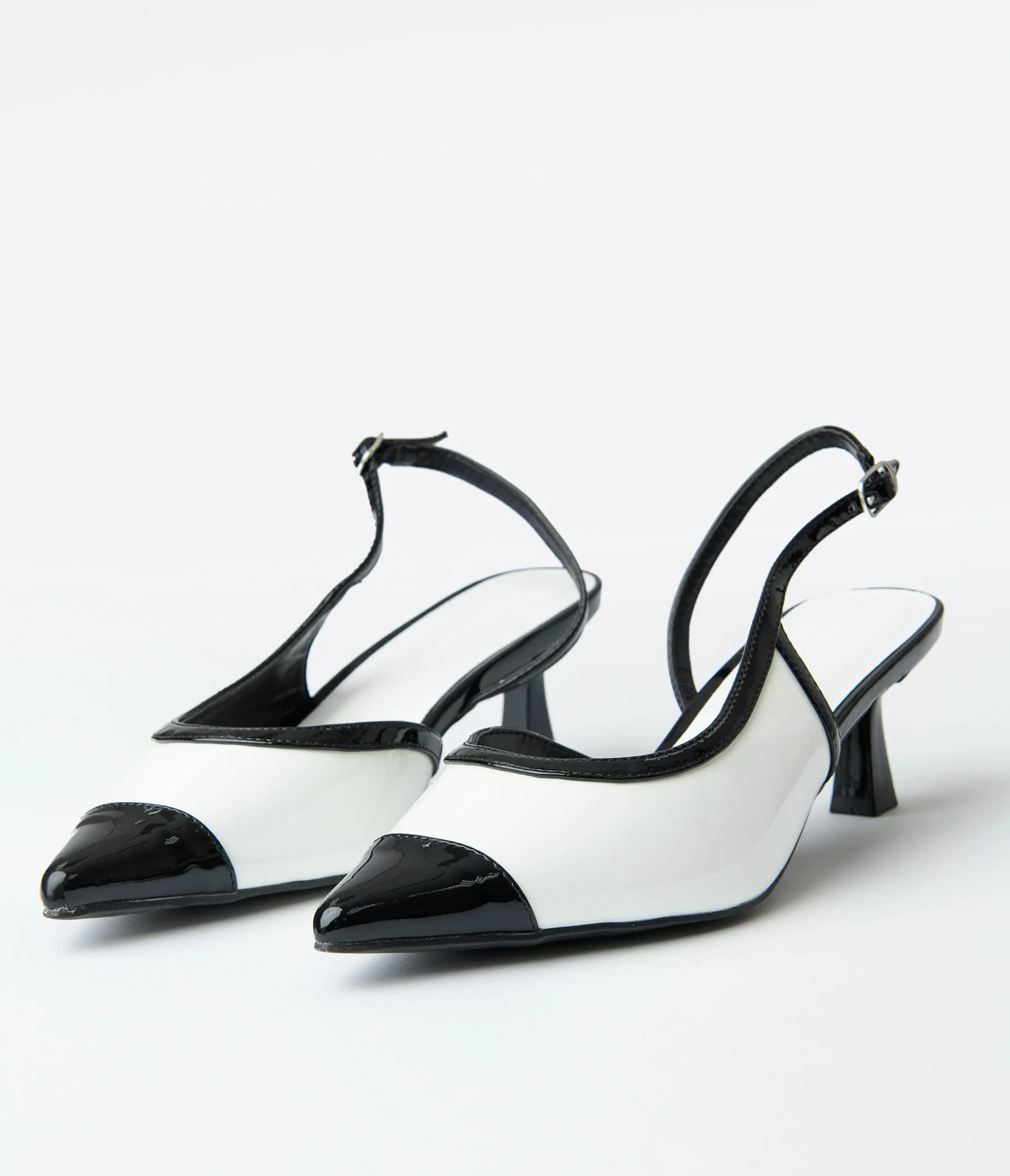 White & Black Patent Leatherette Kitten Heels sold by Unique Vintage