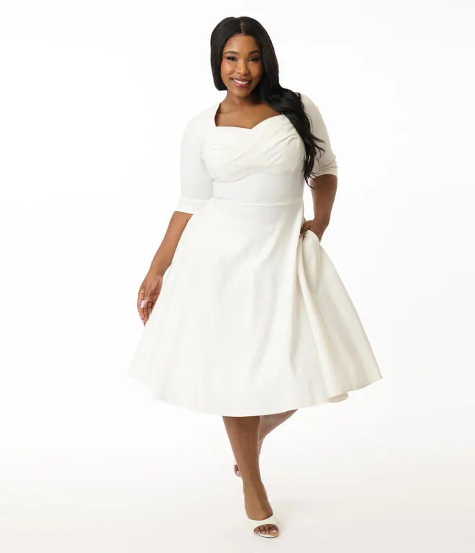 Unique Vintage Plus Size 1950s Ivory Pleated Bust Swing Dress made by Unique Vintage