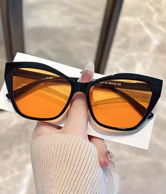 Unique Vintage Black & Orange Lens Geometric Sunglasses made by Unique Vintage