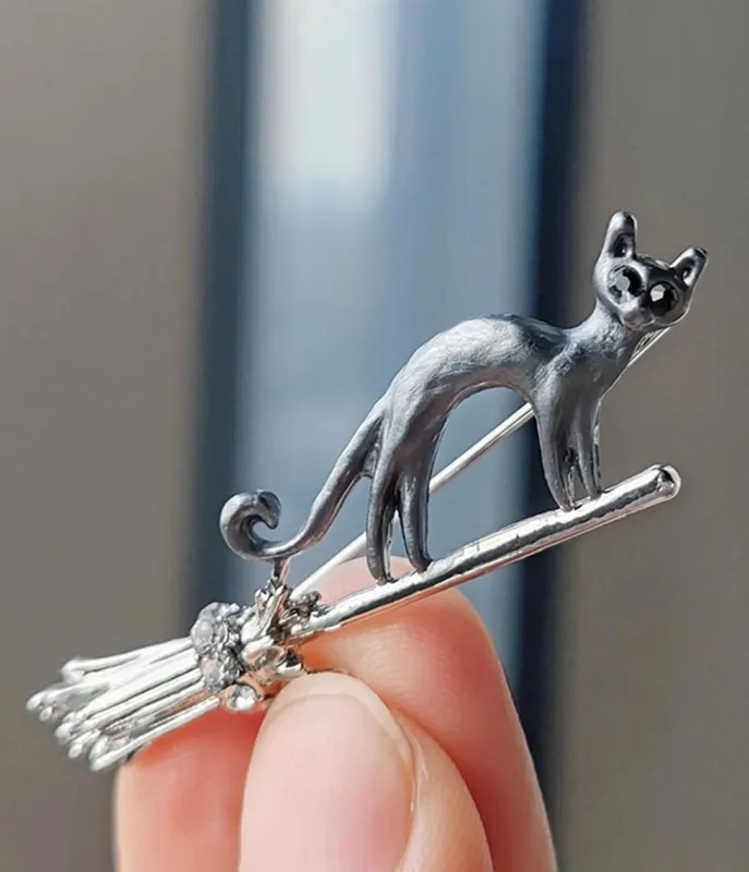 Black Cat On A Broom Brooch made by Unique Vintage