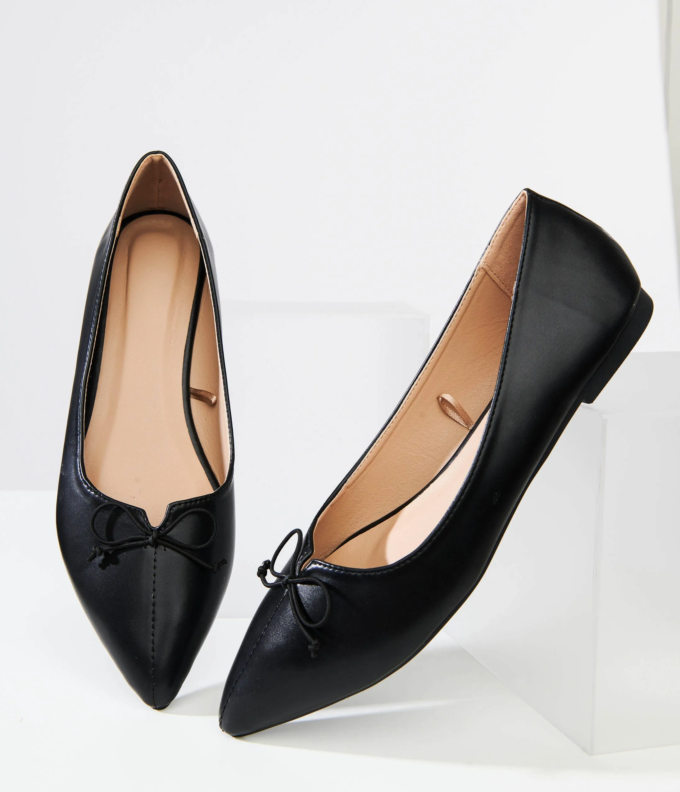 1990s Black Bow Pointed Leatherette Flats sold by Unique Vintage