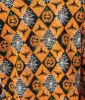 Black & Orange Spooky Argyle Fiona Cardigan sold by Unique Vintage