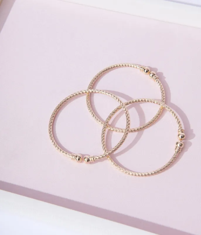 Gold Rope Stack Bracelets sold by Unique Vintage
