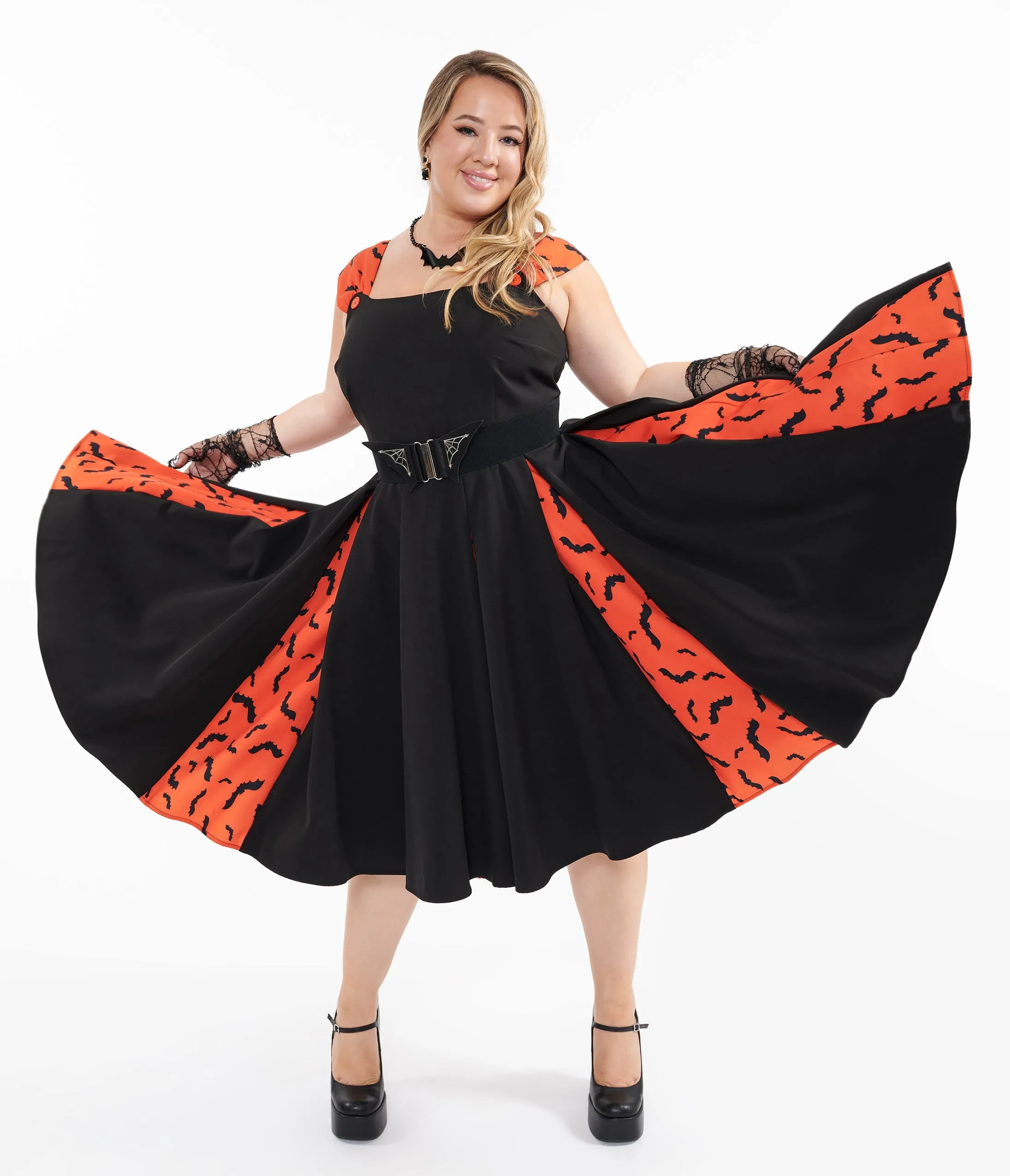 Unique Vintage Plus Size 1950s Orange & Black Bat Stripe Swing Dress sold by Unique Vintage