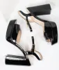 Black Patent Leatherette Peep Toe Platforms sold by Unique Vintage