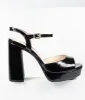 Black Patent Leatherette Peep Toe Platforms sold by Unique Vintage