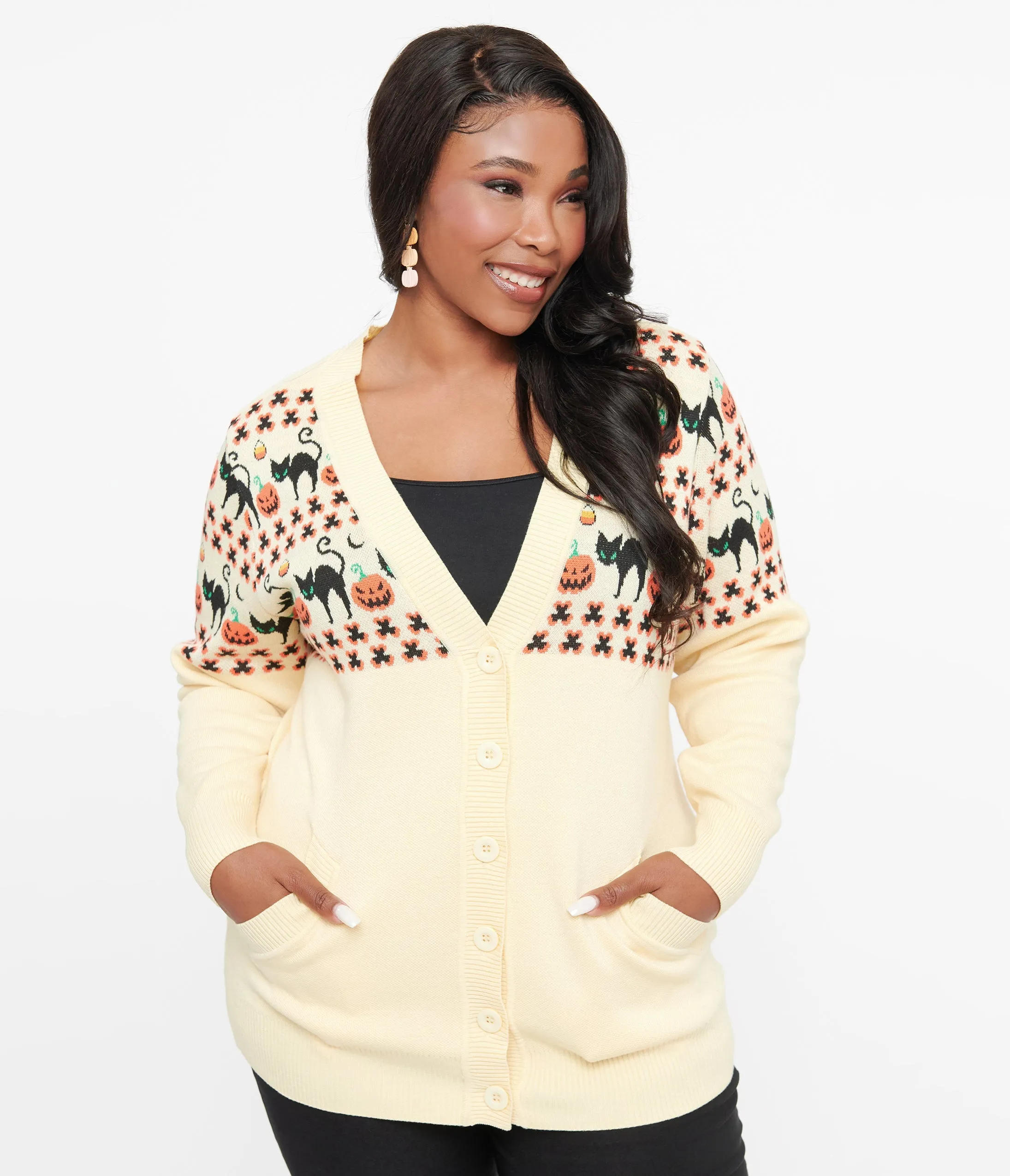 Unique Vintage Plus Size 1960s Ivory & Orange Halloween Print Cardigan sold by Unique Vintage