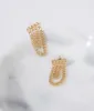 Gold Curb Chain Link Earrings sold by Unique Vintage