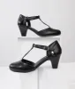 Unique Vintage 1920s Black Leatherette Closed Toe T-Strap Roxy Pumps sold by Unique Vintage