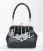 1950s Black & White Bat Wing Miss Foxy Handbag sold by Unique Vintage